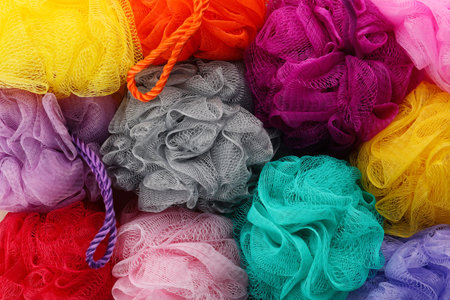 Many colorful shower puffs as background, closeupの写真素材