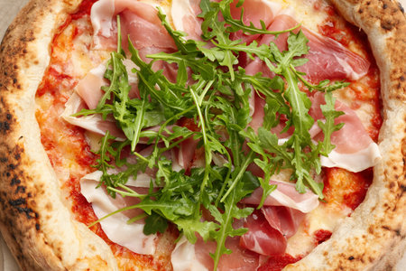 Tasty pizza with meat and arugula, top viewの写真素材