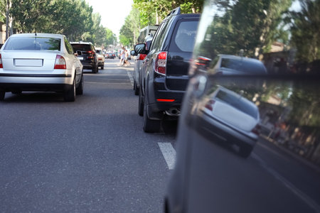 Cars in traffic jam on city street