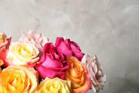 Luxury bouquet of fresh roses on beige background, closeupの写真素材