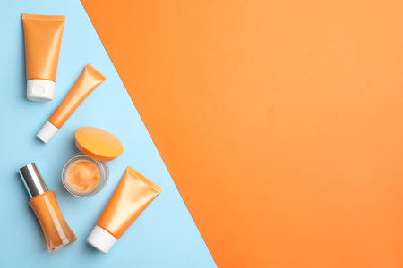 Set of luxury cosmetic products on color background, flat lay. Space for textの写真素材