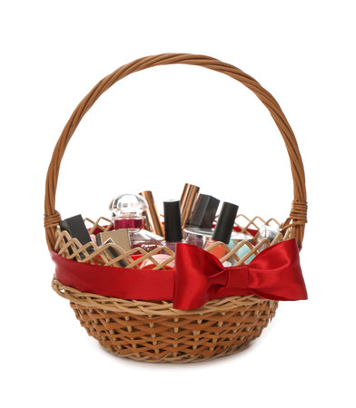 Gift set in wicker basket isolated on whiteの写真素材