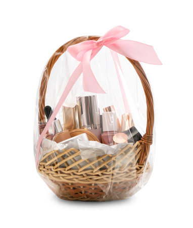 Wicker gift basket with cosmetic products isolated on whiteの写真素材