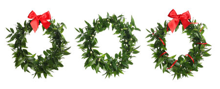 Set with mistletoe wreaths on white background, banner design. Traditional Christmas decorの写真素材