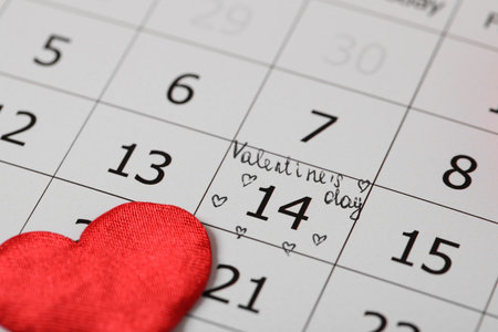 Calendar with marked Valentine's Day and red heart, closeupの写真素材