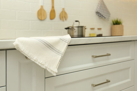 Cotton towel on countertop in modern kitchenの写真素材