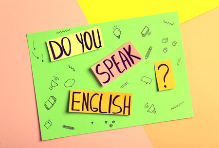 Note with question Do You Speak English on color background, top viewの写真素材
