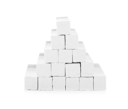 Small pieces of chalk on white backgroundの写真素材