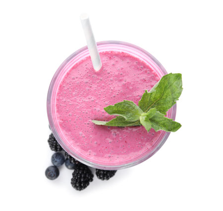 Tasty fresh milk shake with berries on white background, top viewの写真素材