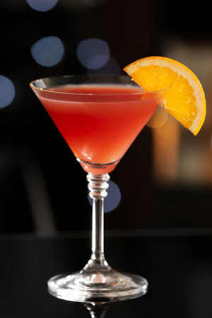 Delicious cocktail with orange on bar counterの写真素材