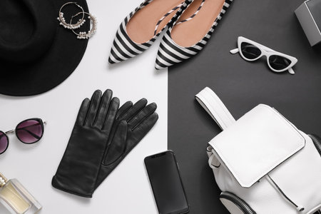 Flat lay composition with stylish black leather gloves, shoes and accessories on color backgroundの写真素材