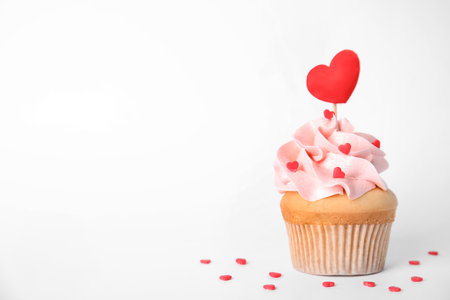 Tasty cupcake on white background. Valentine's Day celebrationの写真素材