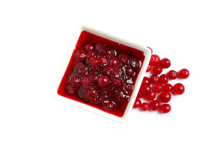 Cranberry sauce and fresh berries on white background, top viewの写真素材