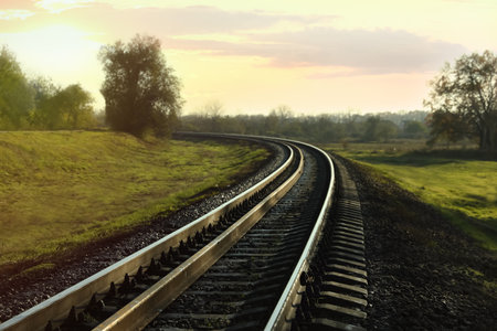 Railway line in countryside on sunny day. train journeyの写真素材