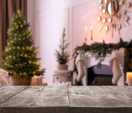 Empty wooden surface and blurred view of room decorated for Christmas, space for text. Interior designの写真素材