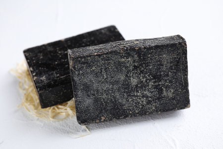 Natural tar soap on white background, closeupの写真素材