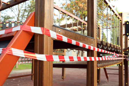 Empty children's playground closed during pandemic quarantine, closeupの写真素材