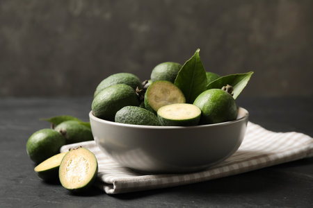 Fresh green feijoa fruits on black table, closeupの写真素材