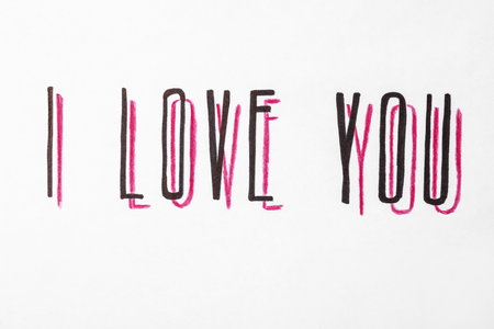 Handwritten text I Love You on white backgroundの写真素材