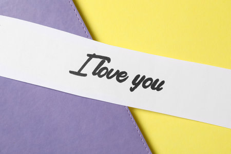 Card with text I Love You on color background, top viewの写真素材