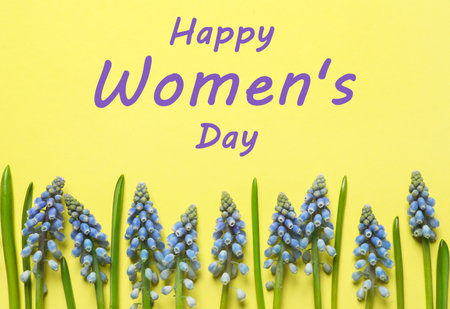 Spring flowers on yellow background, flat lay. Happy Women's Dayの写真素材