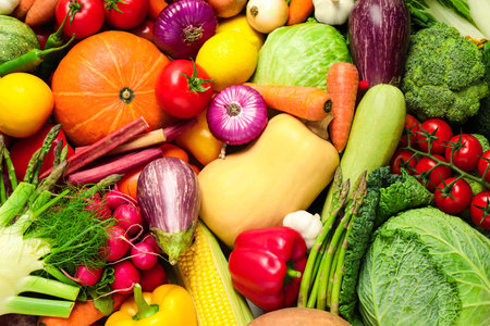 Many fresh vegetables as background, top viewの写真素材