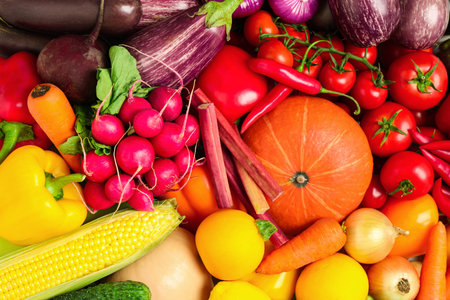 Many fresh vegetables as background, top viewの写真素材