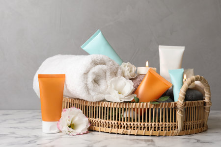 Composition with cosmetic products on white marble tableの写真素材