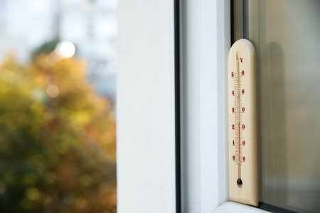 weather thermometer outside window. Space for textの写真素材
