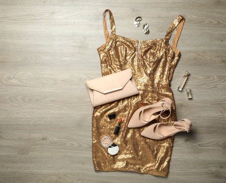 Flat lay composition with stylish shoes on wooden backgroundの写真素材