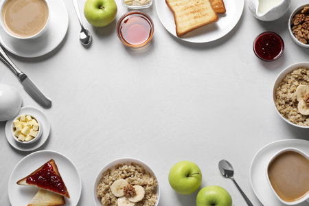Flat lay composition with tasty breakfast food and coffee on white table. Space for textの写真素材