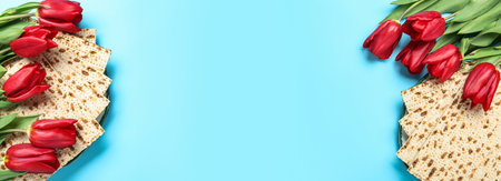 Matzos and flowers on light blue background, flat lay with space for text. Passover (Pesach) Sederの写真素材