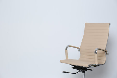 Comfortable office chair on white background, space for textの写真素材