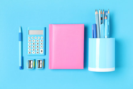Different stationery on light blue background, flat lay. back to schoolの写真素材