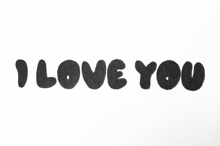 Handwritten text I Love You on white backgroundの写真素材