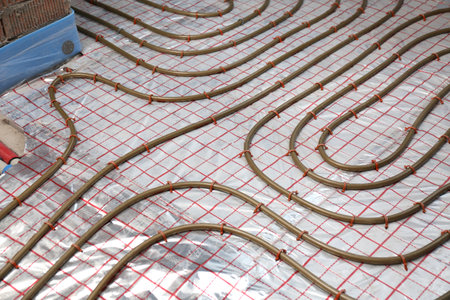 Installation of underfloor heating system in buildingの写真素材