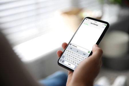 Man sending message with text I Love You, closeupのeditorial素材