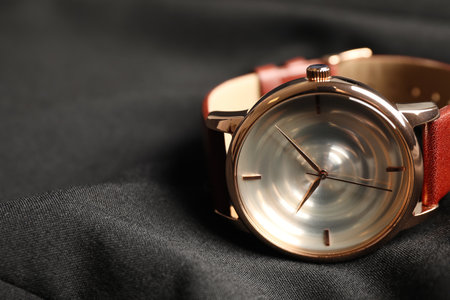 Luxury wrist watch on black background, closeup. Space for textの写真素材
