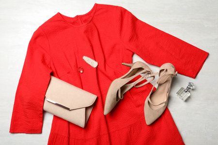Flat lay composition with beautiful shoes on light backgroundの写真素材