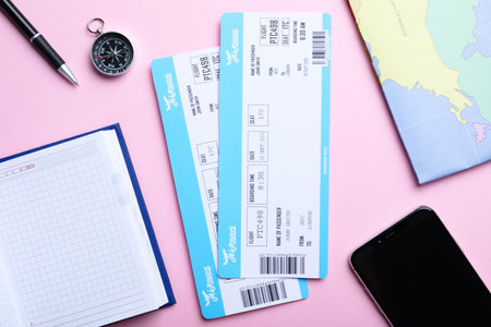 Flat lay composition with tickets on pink background. travel agency conceptの写真素材