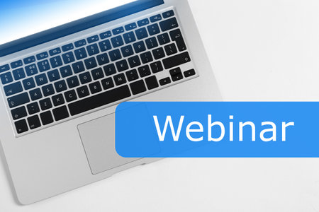 Webinar - progressive online learning. Modern laptop on table, top viewの写真素材