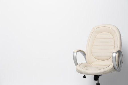 Comfortable office chair on white background, space for textの写真素材