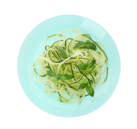 Tasty zucchini pasta with basil isolated on white, top viewの写真素材
