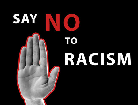Say no to racism. Man showing hand on black background, closeupの写真素材