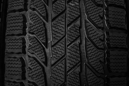 Winter tire as background, closeup. car maintenanceの写真素材