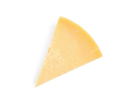 Piece of delicious parmesan cheese isolated on white, top viewの写真素材