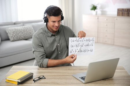 Teacher giving online lesson during quarantine. Studying at home