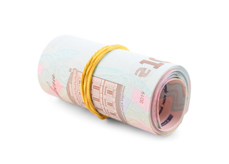 Roll of Ukrainian money on white backgroundの写真素材