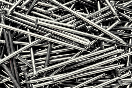 Pile of metal nails as background, closeupの写真素材