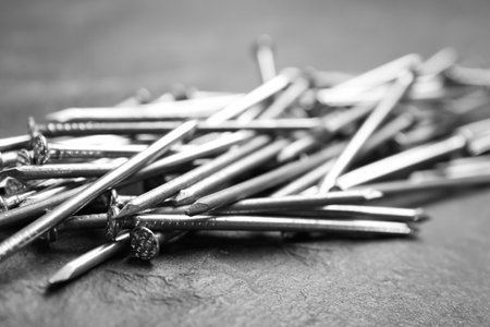 Many metal nails on gray background, closeupの写真素材